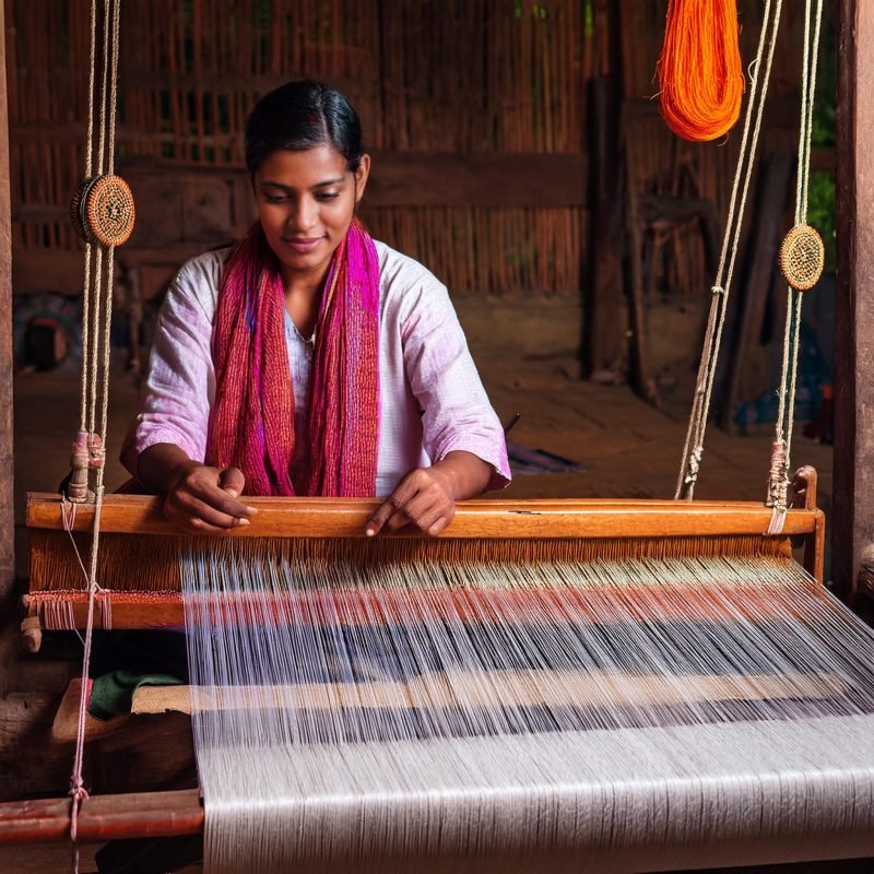 A weaver sits in a small, beautiful rural workshop 10-12-2024 at 12-58-34